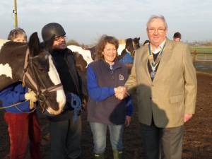 The picture shows Clive Brown, President of Danetre Rotary Club, presenting a cheque to Liz Kenworthy-Browne, RDA Organiser.